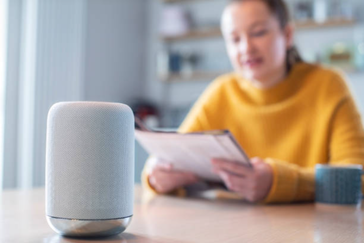 Student reviewing notes in front of Alexa